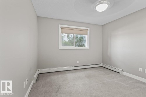 #116 9910 107 St, Morinville, AB - Indoor Photo Showing Other Room