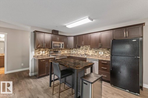 #116 9910 107 St, Morinville, AB - Indoor Photo Showing Kitchen With Upgraded Kitchen