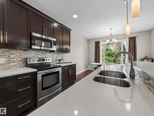 5718 42 Street, Beaumont, AB - Indoor Photo Showing Kitchen With Double Sink With Upgraded Kitchen
