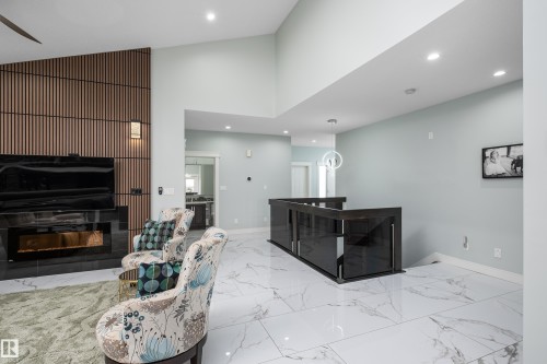 18 Lakevista Point(E), Beaumont, AB - Indoor With Fireplace