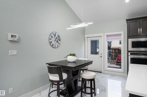 18 Lakevista Point(E), Beaumont, AB - Indoor Photo Showing Dining Room