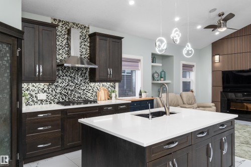 18 Lakevista Point(E), Beaumont, AB - Indoor Photo Showing Kitchen With Double Sink With Upgraded Kitchen