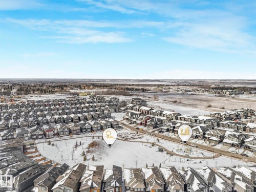 Aerial overview showcasing a residential development with multiple detached homes - 239 Kinglet Boulevard Nw, Edmonton, AB - Outdoor With View