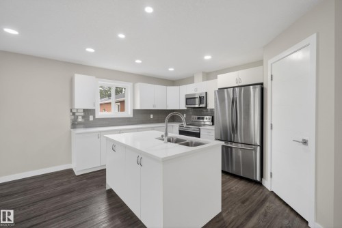 14921 90 Avenue Nw, Edmonton, AB - Indoor Photo Showing Kitchen With Stainless Steel Kitchen With Double Sink With Upgraded Kitchen