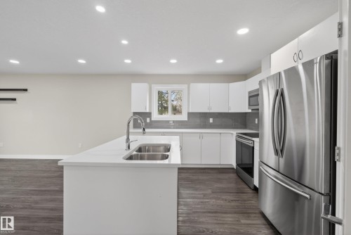 14921 90 Avenue Nw, Edmonton, AB - Indoor Photo Showing Kitchen With Stainless Steel Kitchen With Double Sink