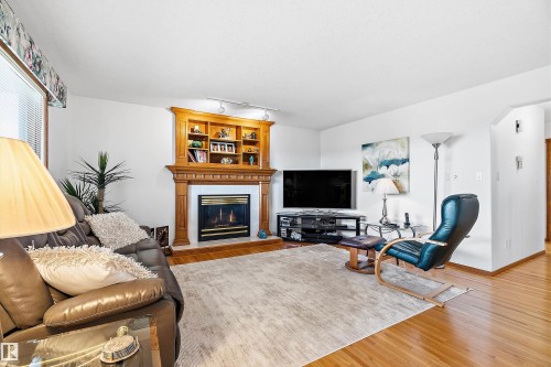 115 Aspen Ridge Crescent, Wetaskiwin, AB - Indoor Photo Showing Living Room With Fireplace