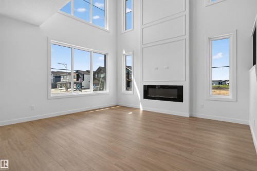 273 Paterson Link Sw, Edmonton, AB - Indoor Photo Showing Living Room With Fireplace