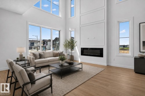 273 Paterson Link Sw, Edmonton, AB - Indoor Photo Showing Living Room With Fireplace