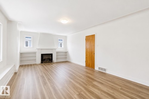 10438 133 Street Nw, Edmonton, AB - Indoor Photo Showing Living Room With Fireplace