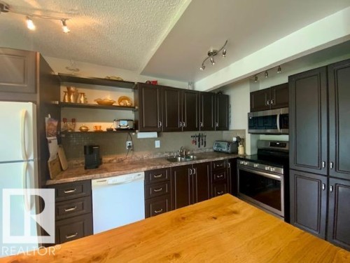 112 Centennial Drive, Wetaskiwin, AB - Indoor Photo Showing Kitchen With Double Sink