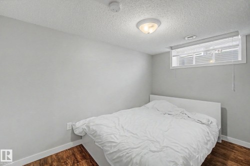 15868 10 Avenue Sw, Edmonton, AB - Indoor Photo Showing Bedroom