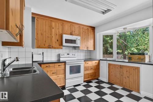 10508 67 Avenue Nw, Edmonton, AB - Indoor Photo Showing Kitchen With Double Sink