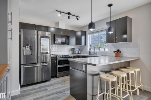 #58 9535 217 St Nw, Edmonton, AB - Indoor Photo Showing Kitchen With Stainless Steel Kitchen With Upgraded Kitchen