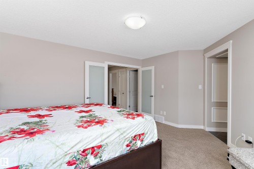 Double Door Entry - 1312 26 Avenue Nw, Edmonton, AB - Indoor Photo Showing Bedroom