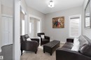 Abundant natural light from multiple windows - 1312 26 Avenue Nw, Edmonton, AB  - Indoor Photo Showing Living Room 