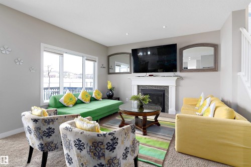 1312 26 Avenue Nw, Edmonton, AB - Indoor Photo Showing Living Room With Fireplace
