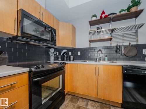 #310 10808 71 Av Nw, Edmonton, AB - Indoor Photo Showing Kitchen With Double Sink