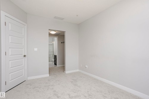 #229 5151 Windermere Bv Sw, Edmonton, AB - Indoor Photo Showing Other Room