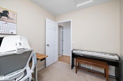 Neutral-toned walls complement the carpeted flooring - 