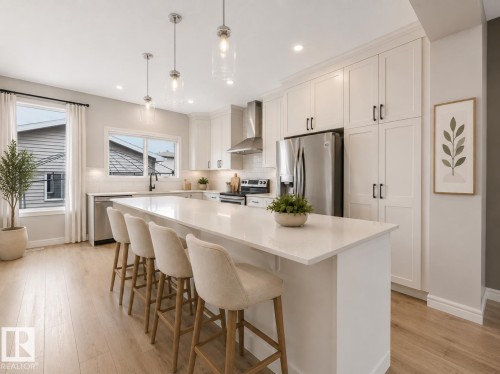 Virtually Staged - 19310 26A Ave Nw, Edmonton, AB - Indoor Photo Showing Kitchen With Stainless Steel Kitchen With Upgraded Kitchen