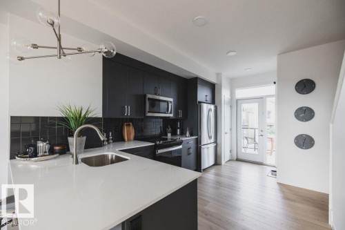 5 Roseburn Trail, Fort Saskatchewan, AB - Indoor Photo Showing Kitchen With Stainless Steel Kitchen With Upgraded Kitchen
