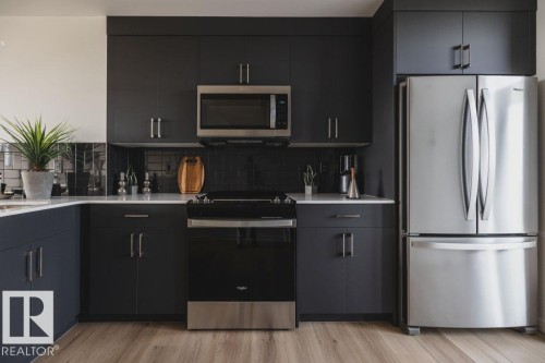 5 Roseburn Trail, Fort Saskatchewan, AB - Indoor Photo Showing Kitchen With Stainless Steel Kitchen