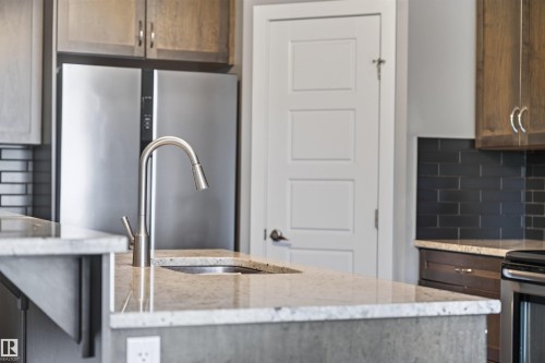 4218 Alexander Bay Sw, Edmonton, AB - Indoor Photo Showing Kitchen With Upgraded Kitchen