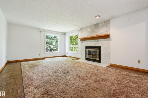 14012 120 Street Nw, Edmonton, AB - Indoor Photo Showing Living Room With Fireplace