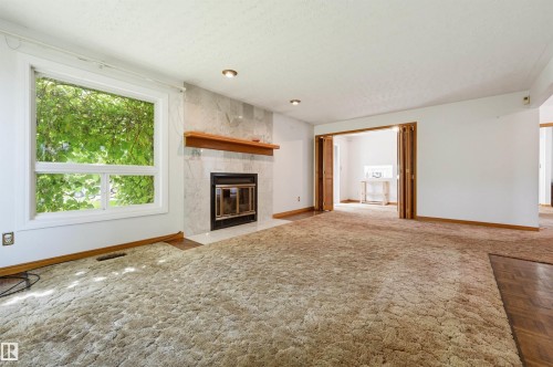 14012 120 Street Nw, Edmonton, AB - Indoor Photo Showing Living Room With Fireplace