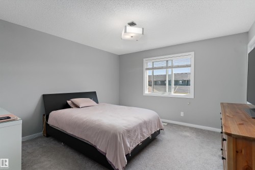 15927 13 Avenue Sw, Edmonton, AB - Indoor Photo Showing Bedroom
