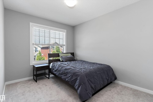 15927 13 Avenue Sw, Edmonton, AB - Indoor Photo Showing Bedroom