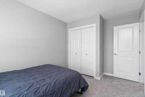 15927 13 Avenue Sw, Edmonton, AB - Indoor Photo Showing Bedroom