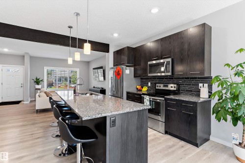 15927 13 Avenue Sw, Edmonton, AB - Indoor Photo Showing Kitchen With Stainless Steel Kitchen With Upgraded Kitchen