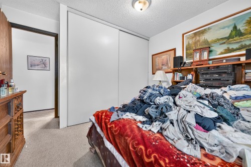 Image quality insufficient for description - #206 10842 107 St Nw, Edmonton, AB - Indoor Photo Showing Bedroom