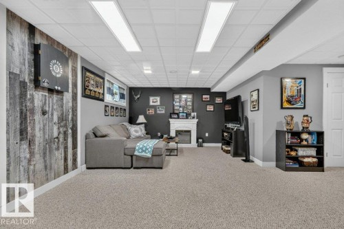 Finished basement featuring recessed lighting and a drop ceiling - 5322 Terwillegar Boulevard Nw, Edmonton, AB - Indoor