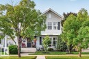 Gabled two-story home featuring light grey siding and dark shutters - 5322 Terwillegar Boulevard Nw, Edmonton, AB  - Outdoor 