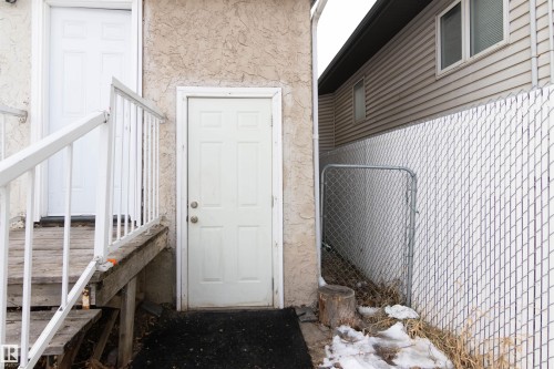View of exterior entry with stucco siding - 11029 95 Street Nw, Edmonton, AB - Outdoor With Exterior