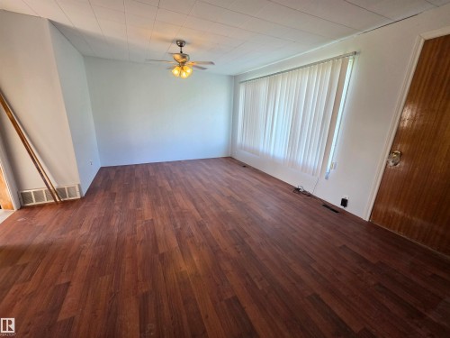 Living Room with brand new laminate flooring - Rural St. Paul County, AB 