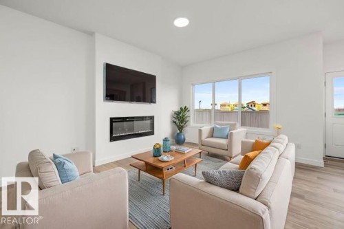 17623 7 Street Ne, Edmonton, AB - Indoor Photo Showing Living Room With Fireplace