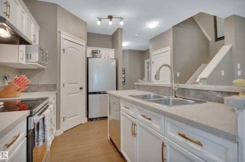 2289 Austin Way Sw, Edmonton, AB - Indoor Photo Showing Kitchen With Double Sink