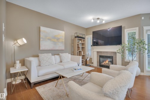 2289 Austin Way Sw, Edmonton, AB - Indoor Photo Showing Living Room With Fireplace