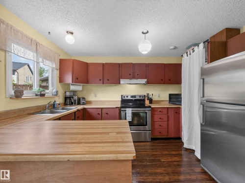 3503 42A Avenue Nw, Edmonton, AB - Indoor Photo Showing Kitchen With Double Sink