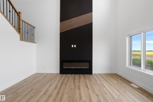 782 Bank Drive, Leduc, AB - Indoor With Fireplace