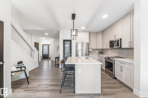 72 Spruce Gardens Crescent, Spruce Grove, AB - Indoor Photo Showing Kitchen With Stainless Steel Kitchen With Upgraded Kitchen
