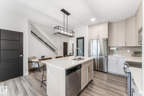 72 Spruce Gardens Crescent, Spruce Grove, AB - Indoor Photo Showing Kitchen With Stainless Steel Kitchen With Double Sink