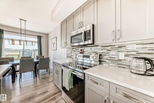 17207 64 Street Nw, Edmonton, AB - Indoor Photo Showing Kitchen With Upgraded Kitchen