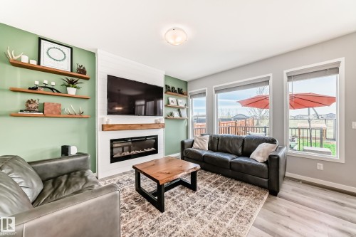 17207 64 Street Nw, Edmonton, AB - Indoor Photo Showing Living Room With Fireplace
