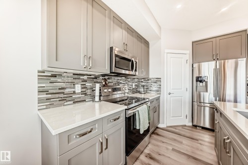 17207 64 Street Nw, Edmonton, AB - Indoor Photo Showing Kitchen With Stainless Steel Kitchen With Upgraded Kitchen