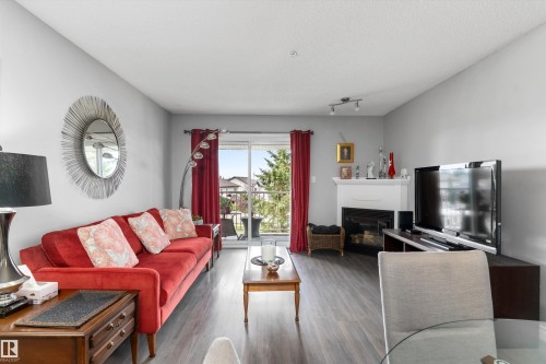 #305A 6 Spruce Ridge Dr, Spruce Grove, AB - Indoor Photo Showing Living Room With Fireplace