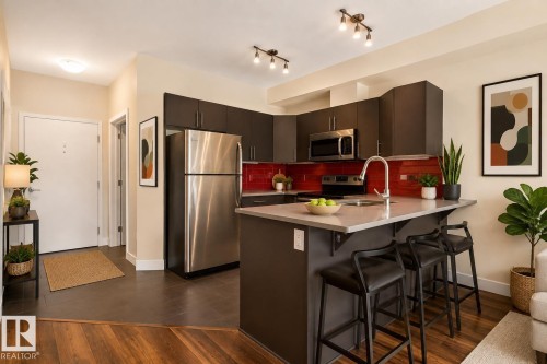 #303 10611 117 St Nw, Edmonton, AB - Indoor Photo Showing Kitchen With Stainless Steel Kitchen